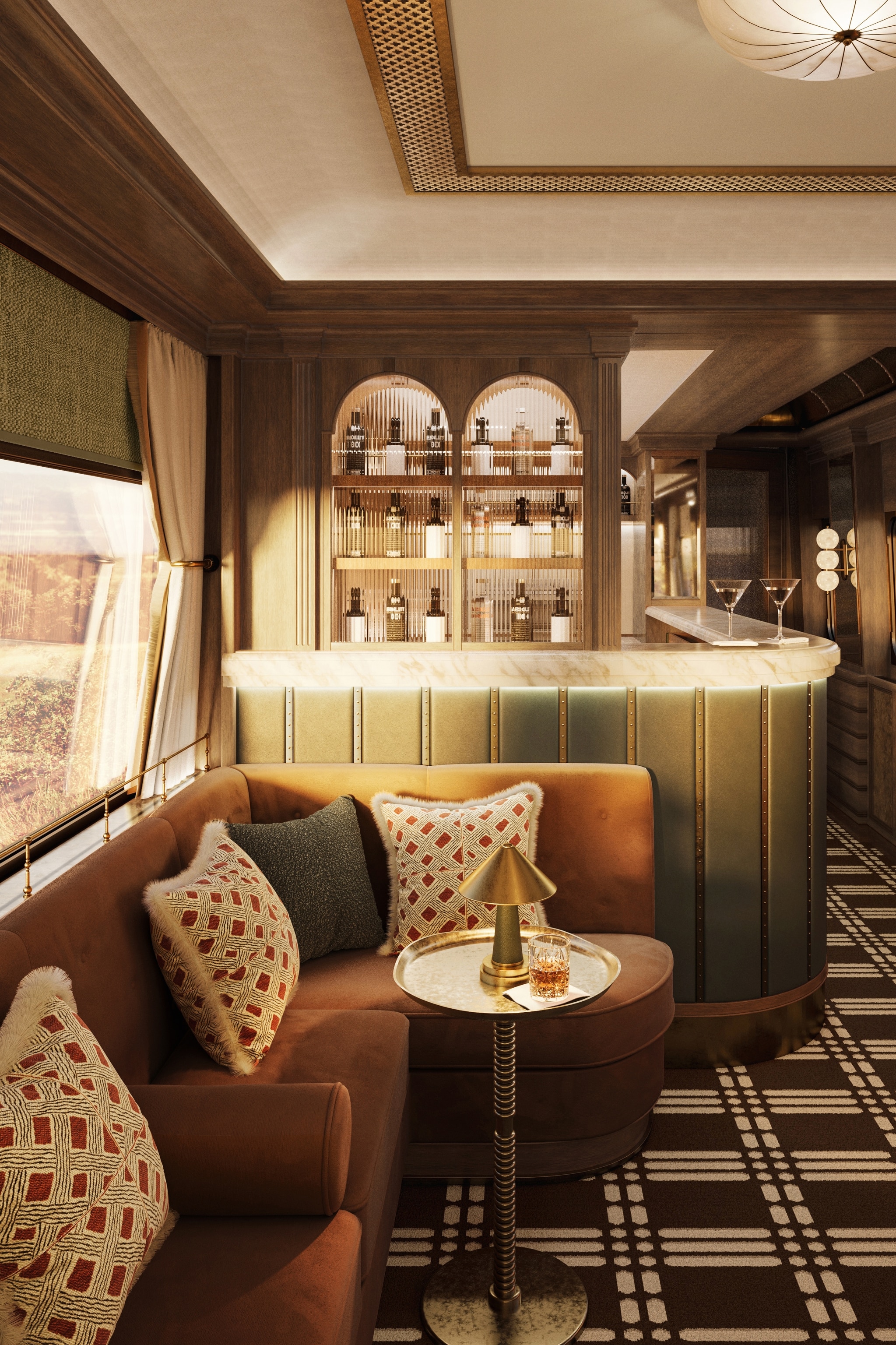 A comfortable and stylish train bar with velvet sofas and geometric patterns.