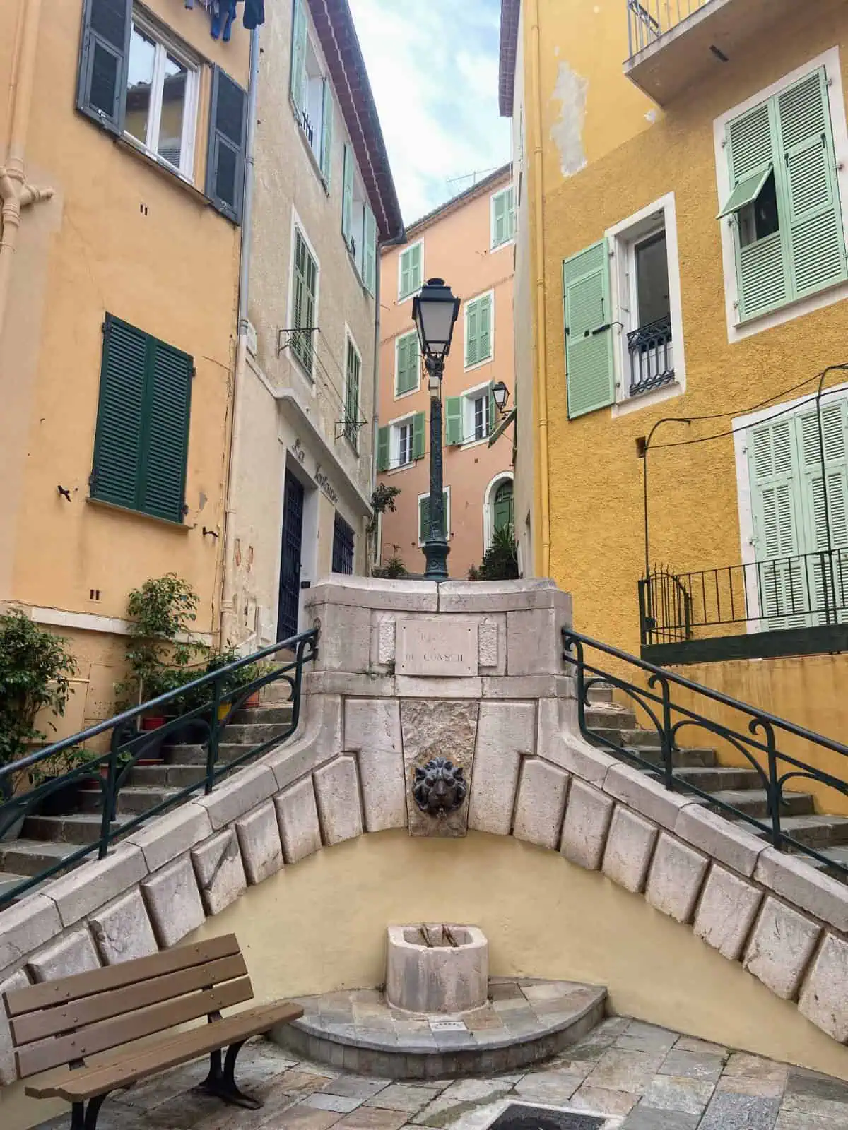 A funky lamppost and fountain in the streets of Villefranche-sur-Mer, French Riviera