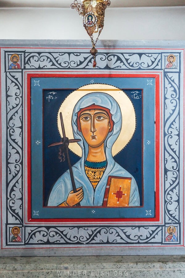 An icon of St. Nino holding a cross hangs on the wall of Poka St Nino Monastery in Javakheti, Georgia.