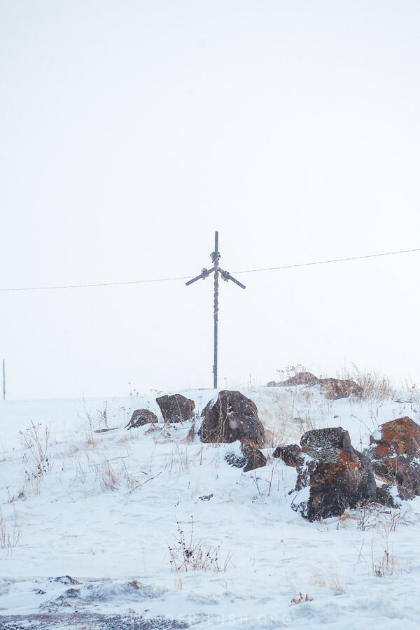 St Nino's Cross mounted on a snowy hill outside a monastery in Southern Georgia.