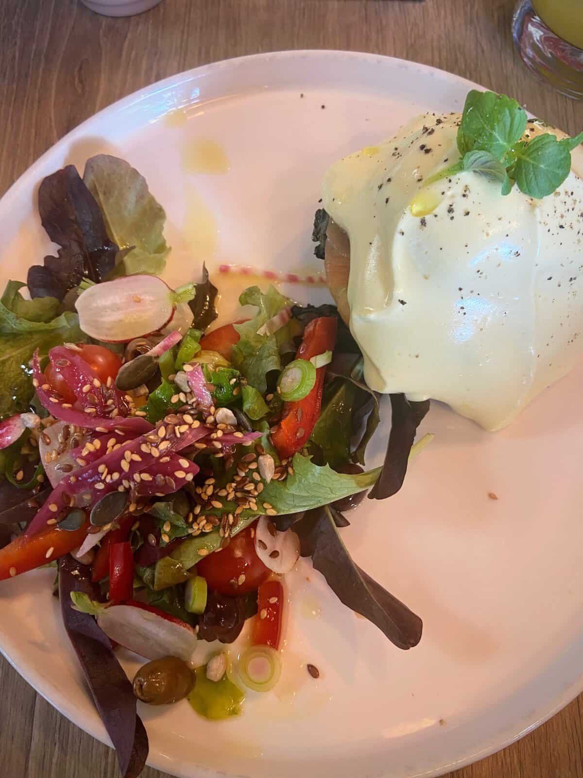 Eggs benedict with salad from Lilian Bonnefoi in Antibes, France