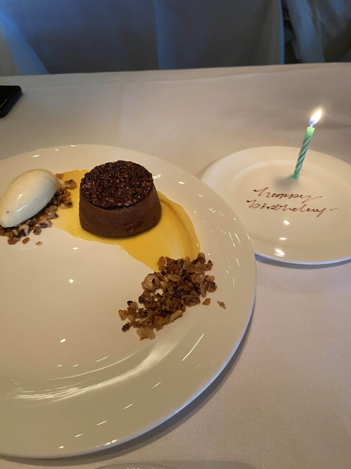 Where to Eat in Yaletown, Vancouver 25 A chocolate cake and scoop of ice cream on a plate for a birthday at Elisa Steakhouse